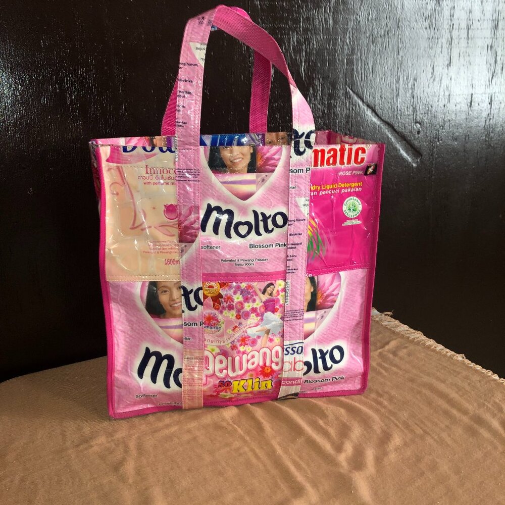 Handmade repurposed recycled tote bag from plastic waste.